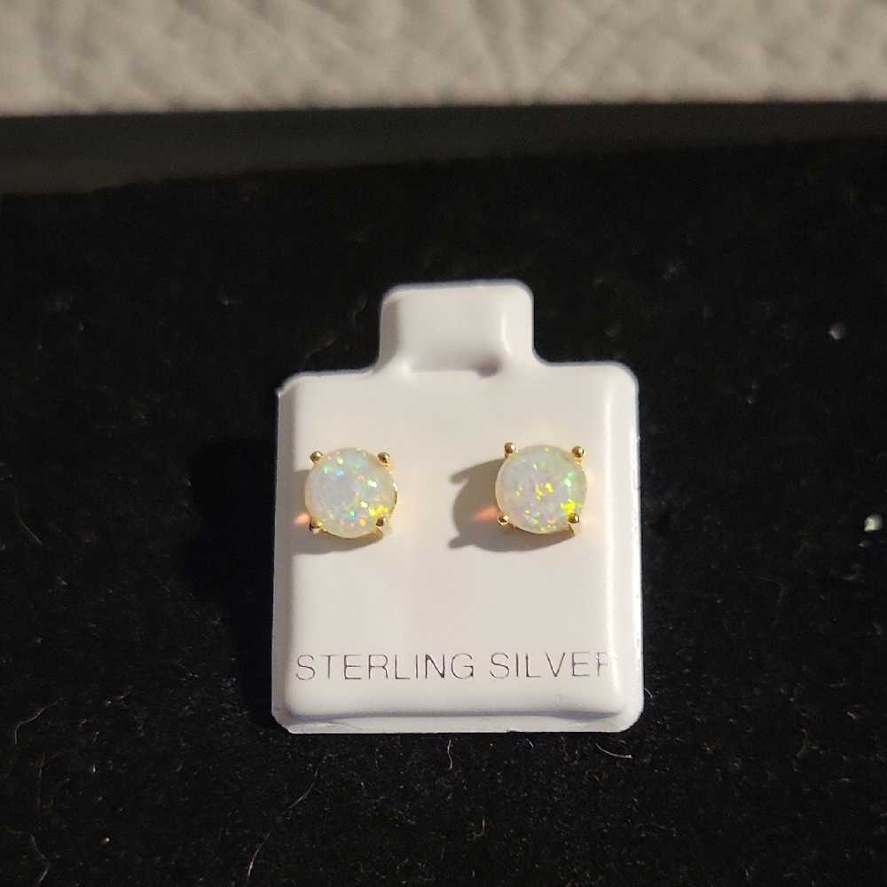 Elegant Opal Stud Earrings in Gold Setting